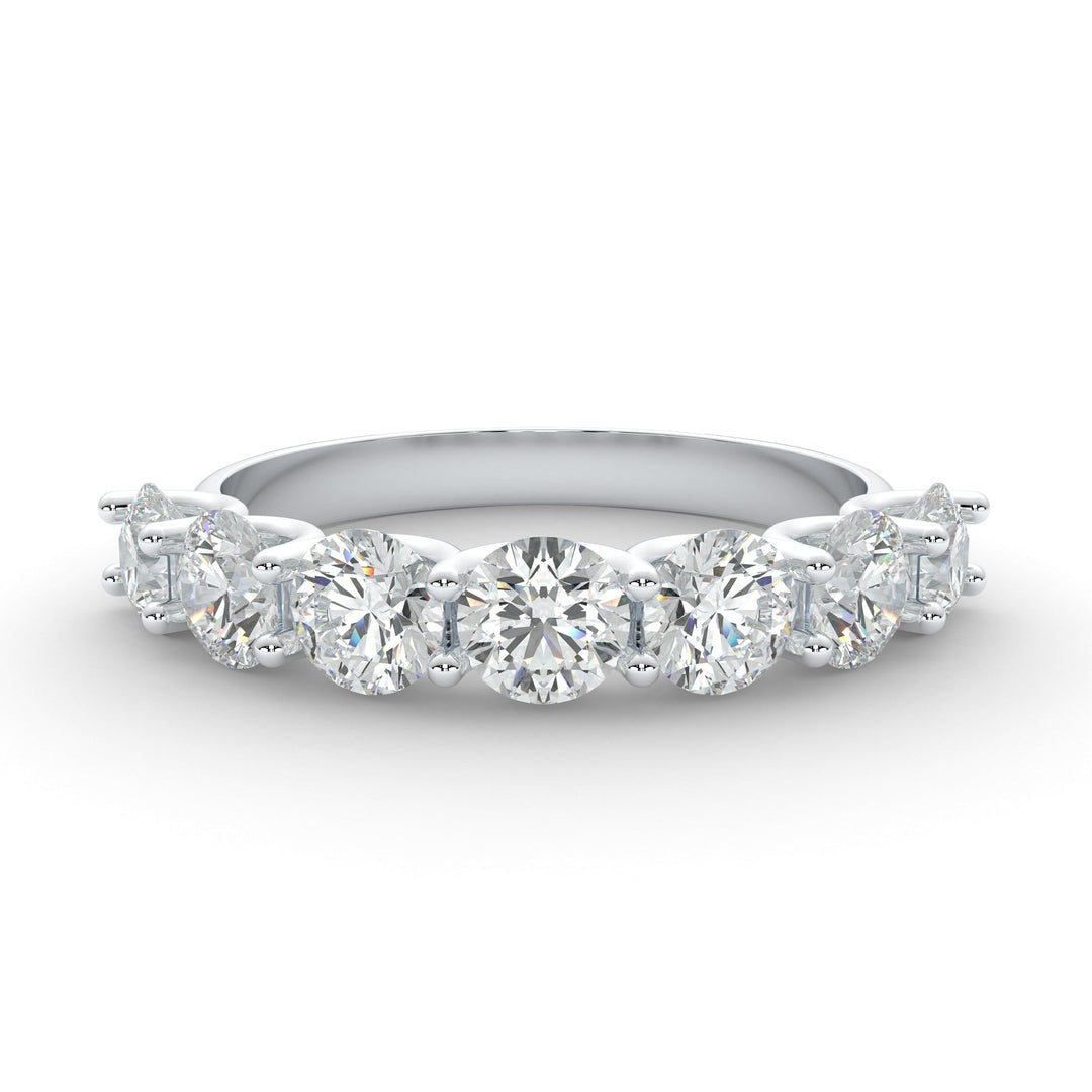 a five stone diamond ring on a white background