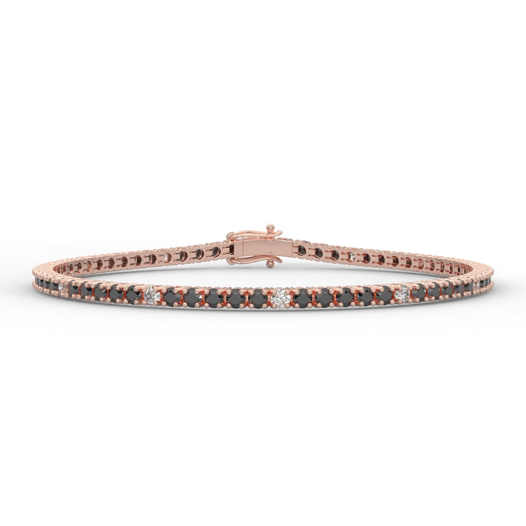 a bracelet with black and white diamonds