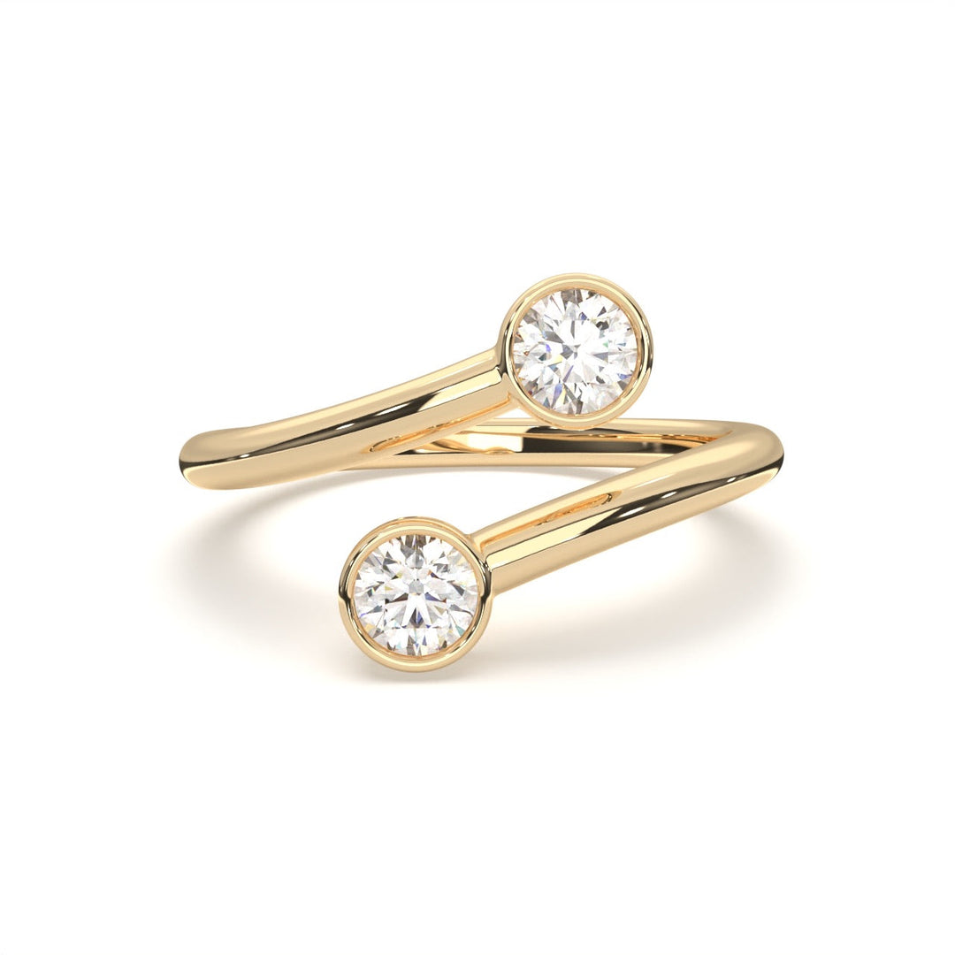 a pair of gold rings with a diamond