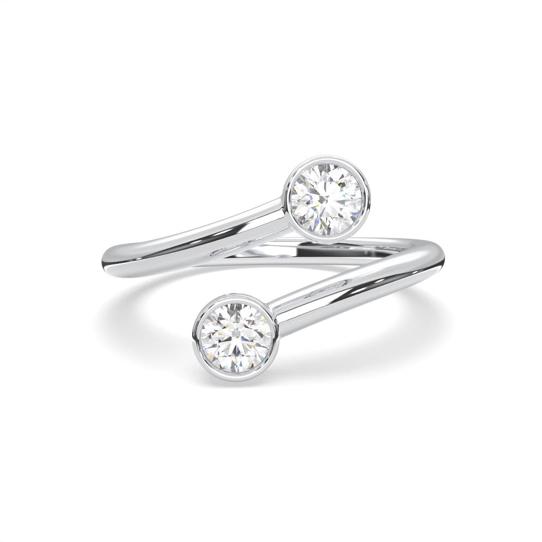 a pair of white gold rings with a diamond