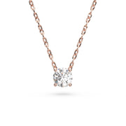A necklace with a single, clear diamond pendant.