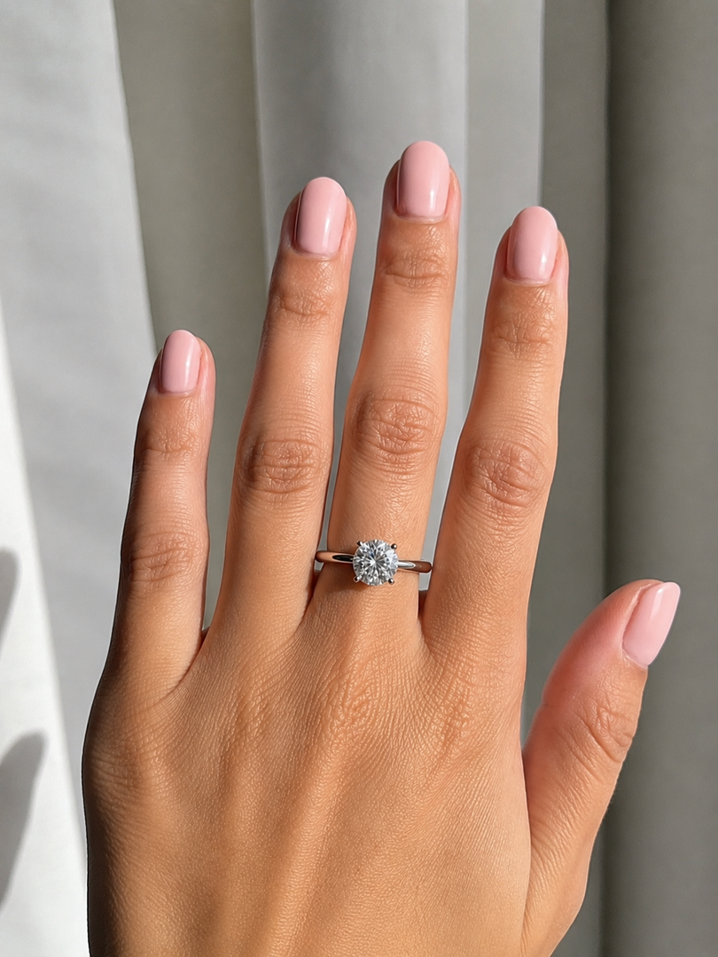 Round solo natural diamond engagement ring in gold